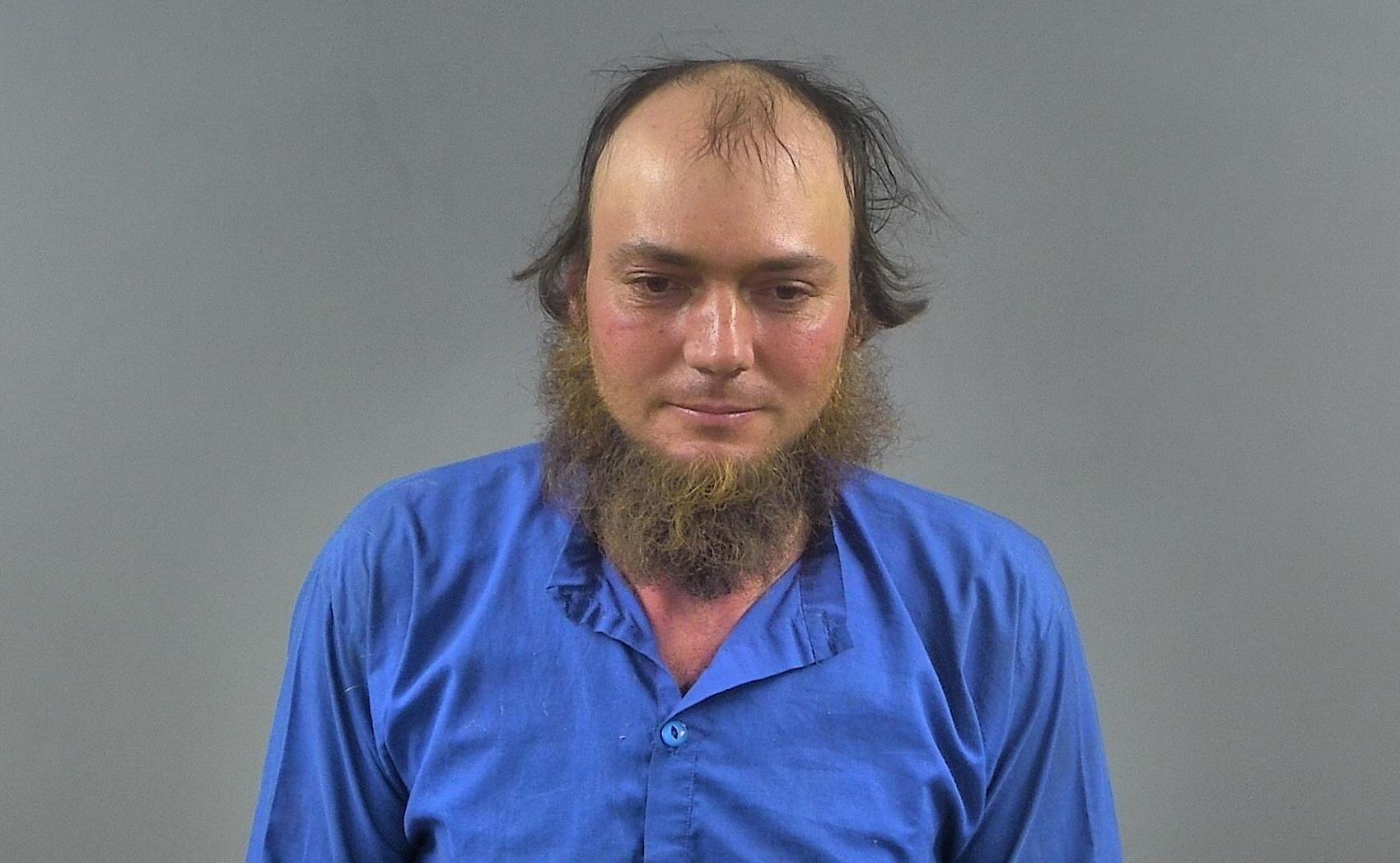 Reuben Yoder, 34, was arrested on 10 felony counts after police in Kentucky accused him of drinking and driving in a horse-drawn carriage that crashed into a vehicle.