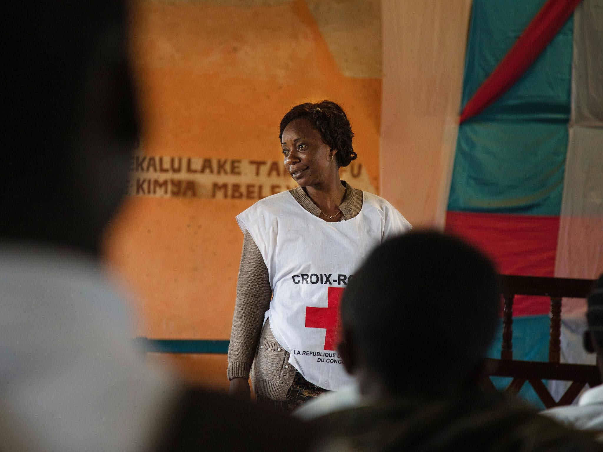 Red Cross volunteers are teaching children about preventing the spread of Ebola