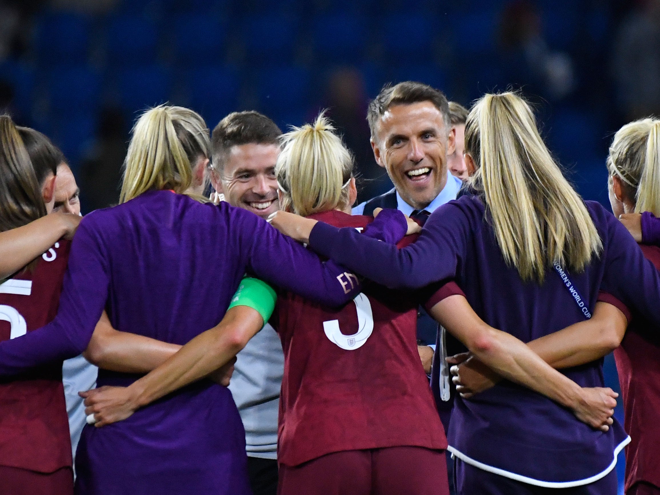 Phil Neville in a post-match huddle with his England players (Getty)