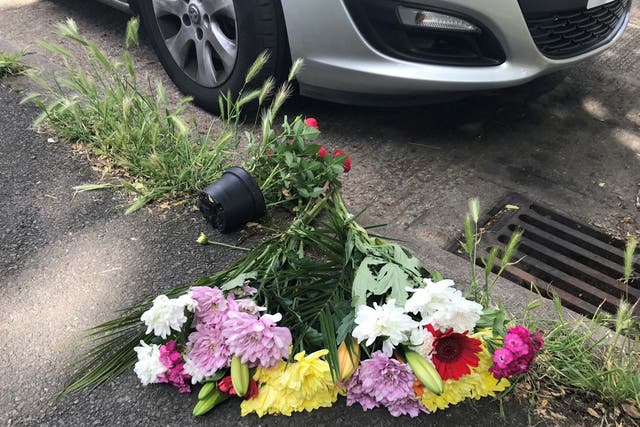 Flowers left near scene of fatal stabbing attack in Wandsworth
