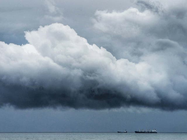 Storm clouds gather off the north east coast as heavy rain falls in the UK