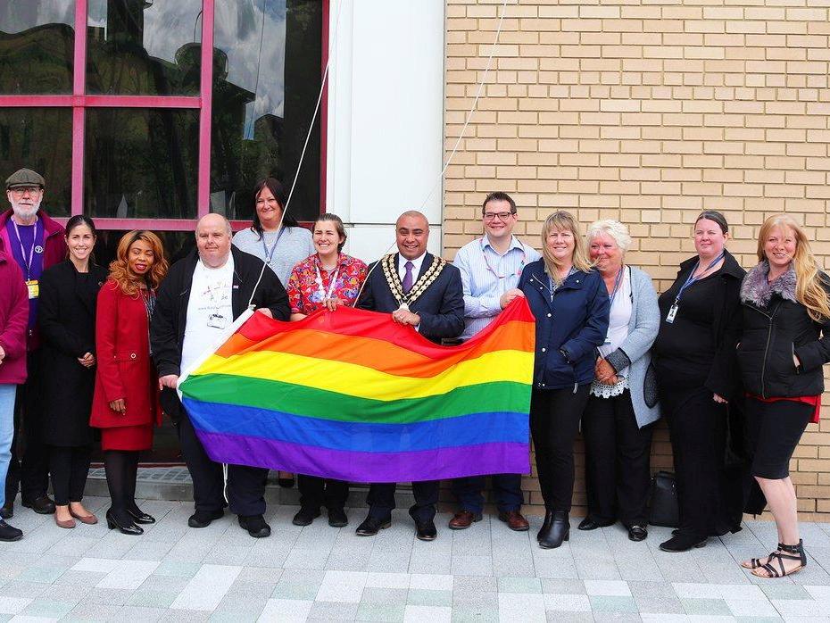 A group of six people chanted racist abuse as Basildon's mayor raised a rainbow flag on Friday