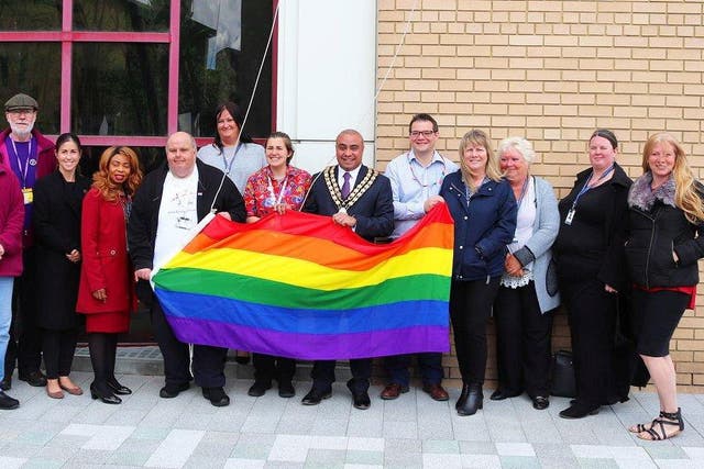 A group of six people chanted racist abuse as Basildon's mayor raised a rainbow flag on Friday