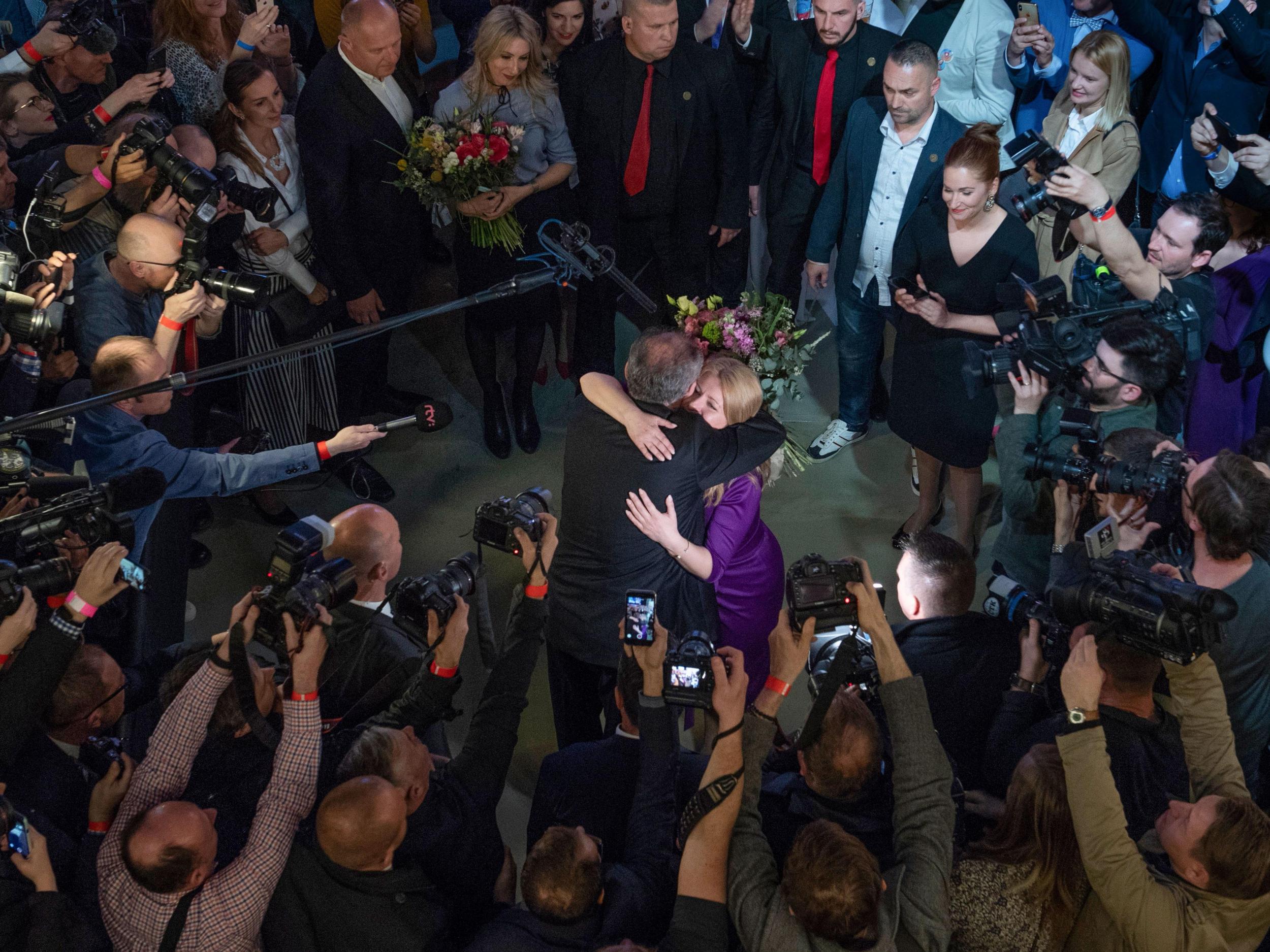 The Slovak President, Andrej Kiska, congratulates Caputova in her headquarters at the time of her electoral win (Getty/iStock)