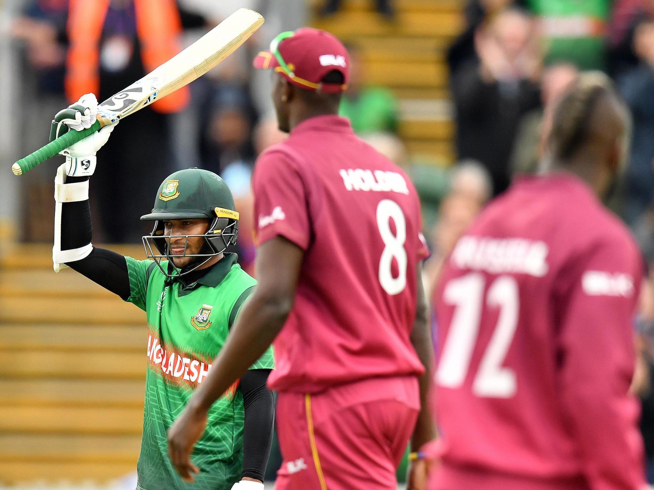 Shakib Al Hasan celebrates reaching his century for Bangladesh