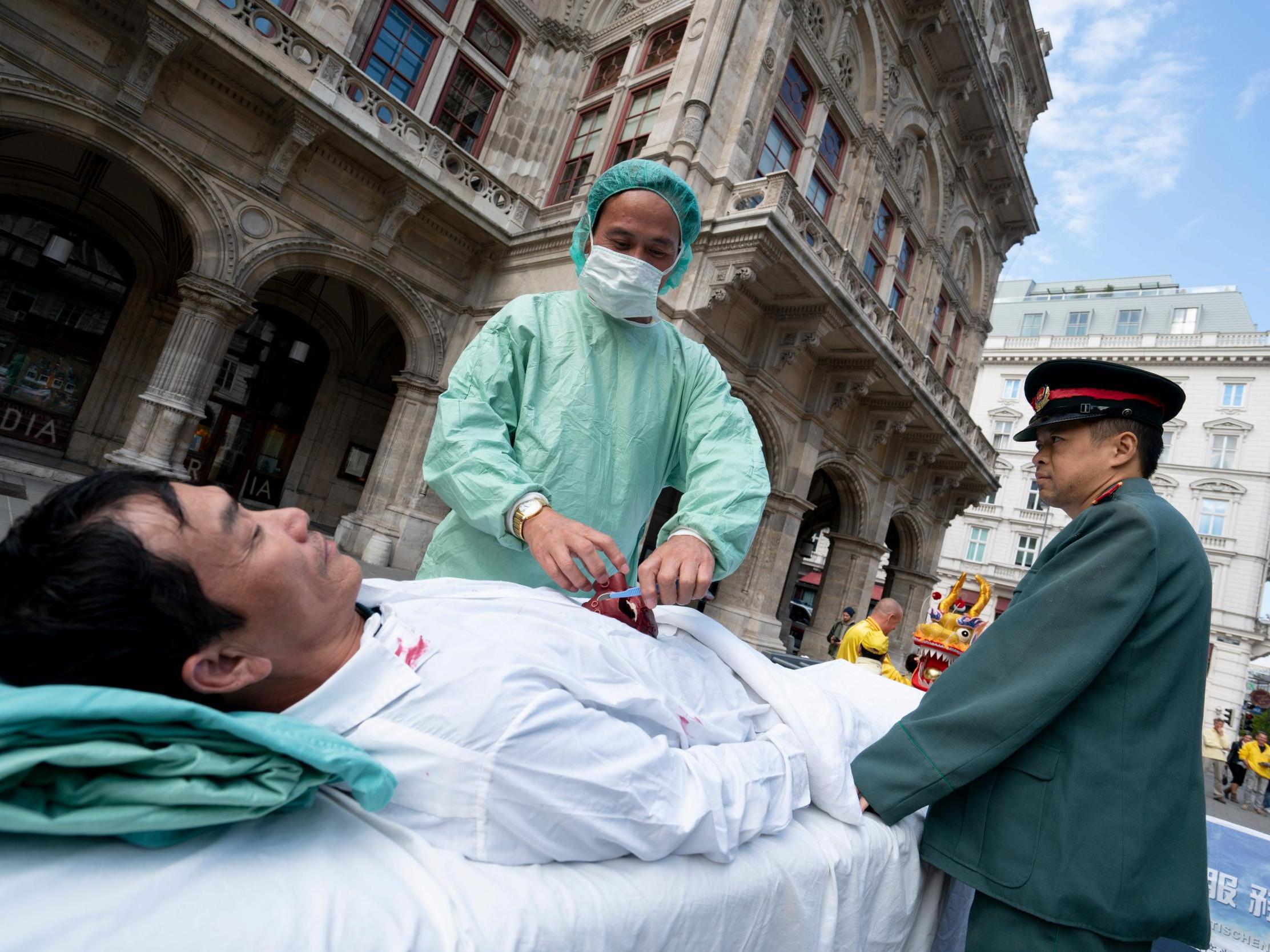 File: Demonstrators protest against against organ harvesting in Vienna