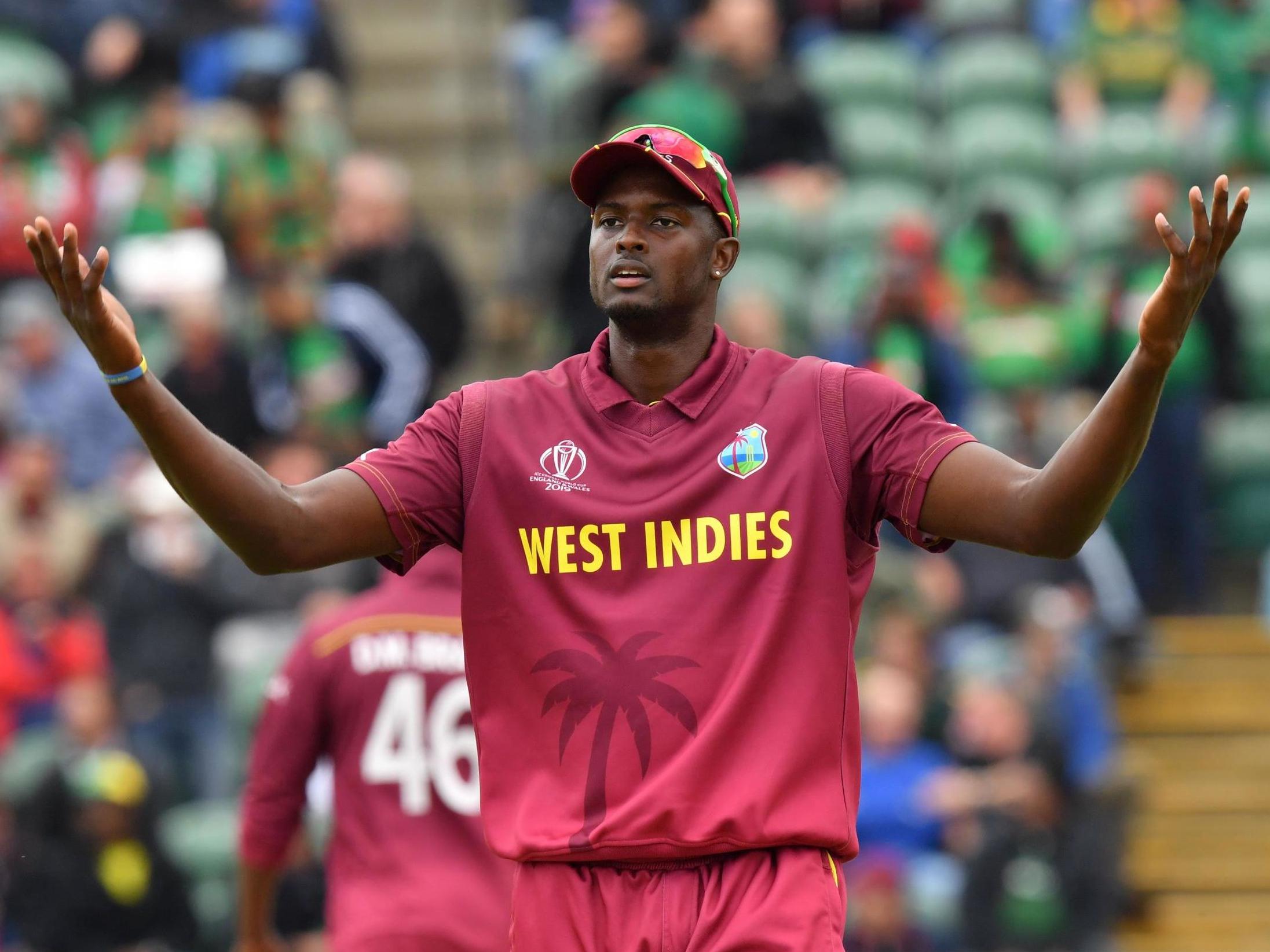 Jason Holder reacts during his side's defeat