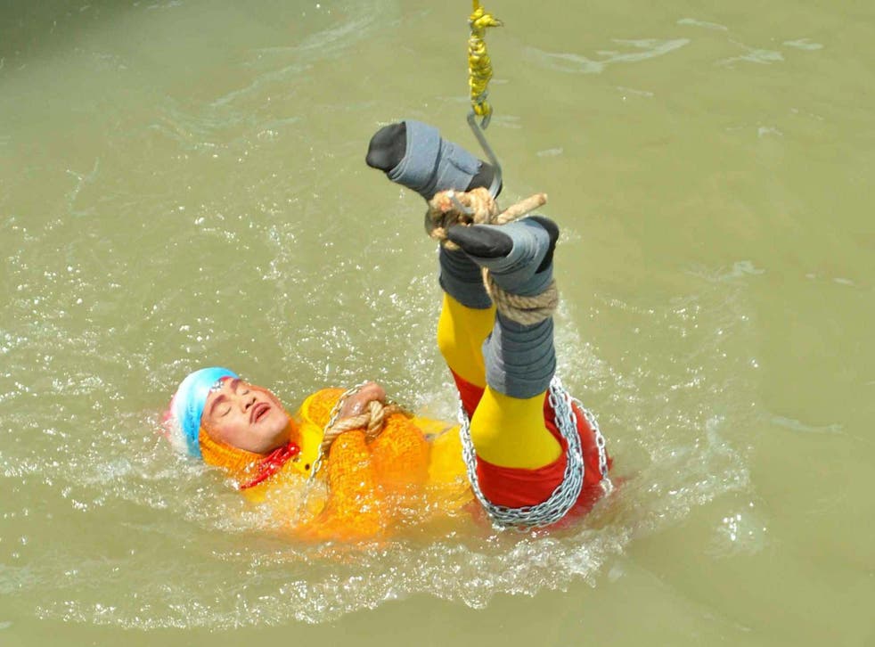 Chanchal Lahiri lowered into the Hooghly river shortly before his death