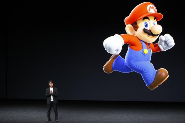 Shigeru Miyamoto, creative fellow at Nintendo and creator of Super Mario, speaks on stage during an Apple launch event on September 7, 2016 in San Francisco, California