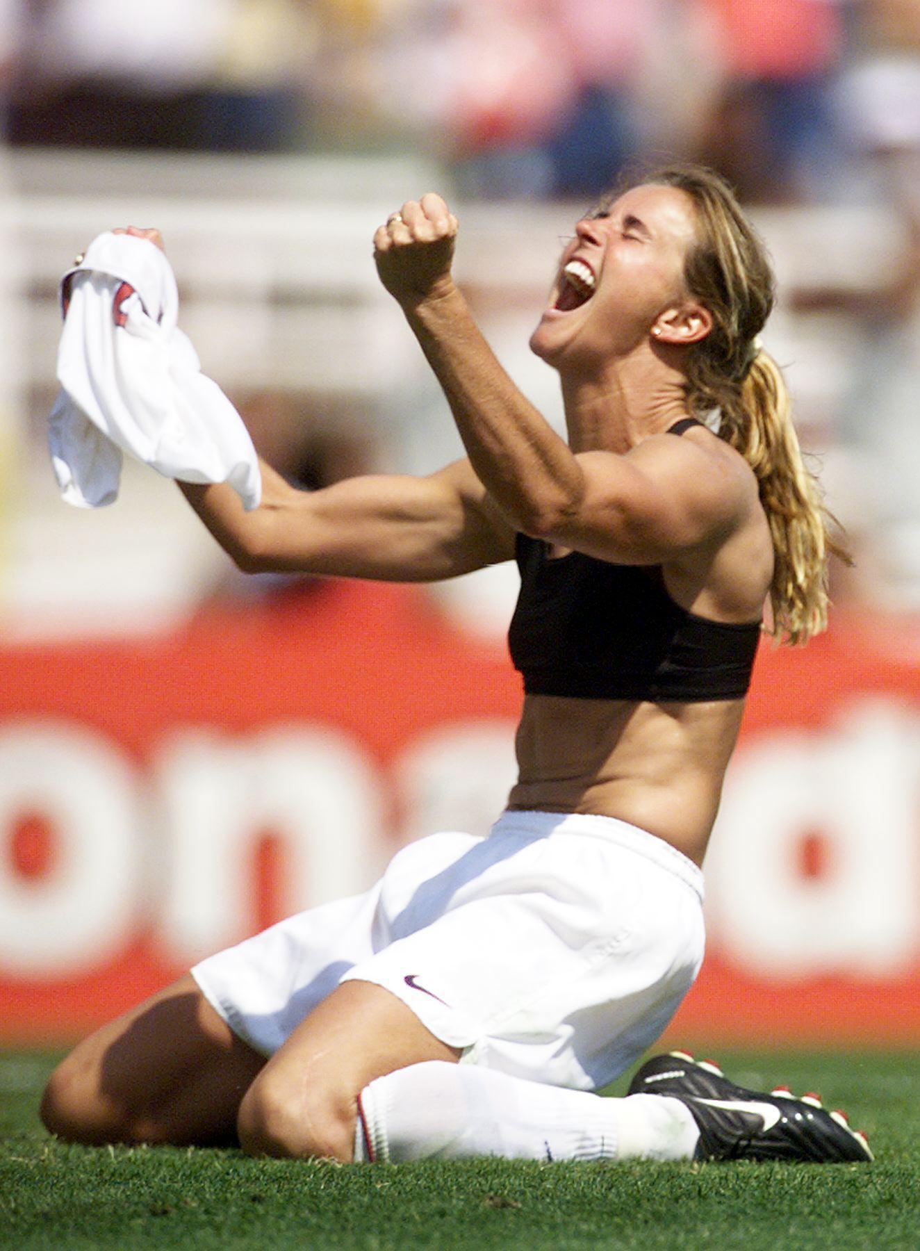 Brandi Chastain celebrates after scoring the winning penalty against China at the 1999 Women’s World Cup