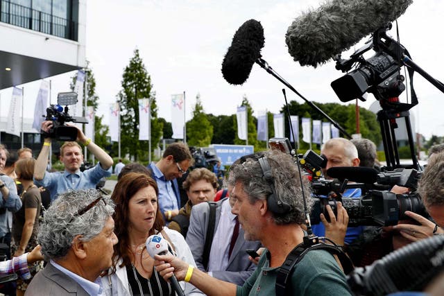 Surviving relatives of the 2014 Malaysia Airlines MH17 crash speak to reporters at the press conference of the Joint Investigation Team in Nieuwegein, The Netherlands, 19 June 2019.