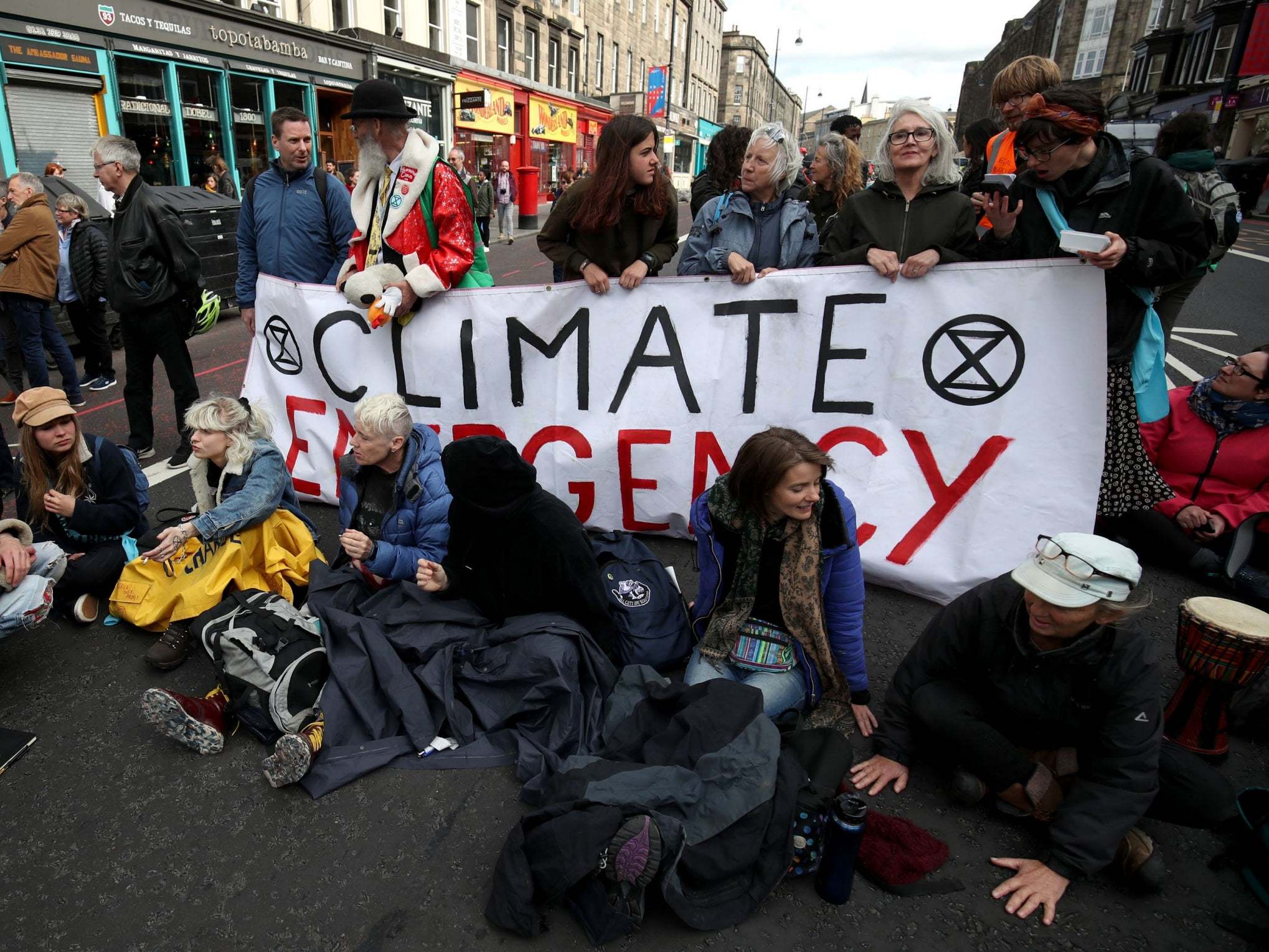Money has already been pledged to Extinction Rebellion groups (pictured) in New York and Los Angeles