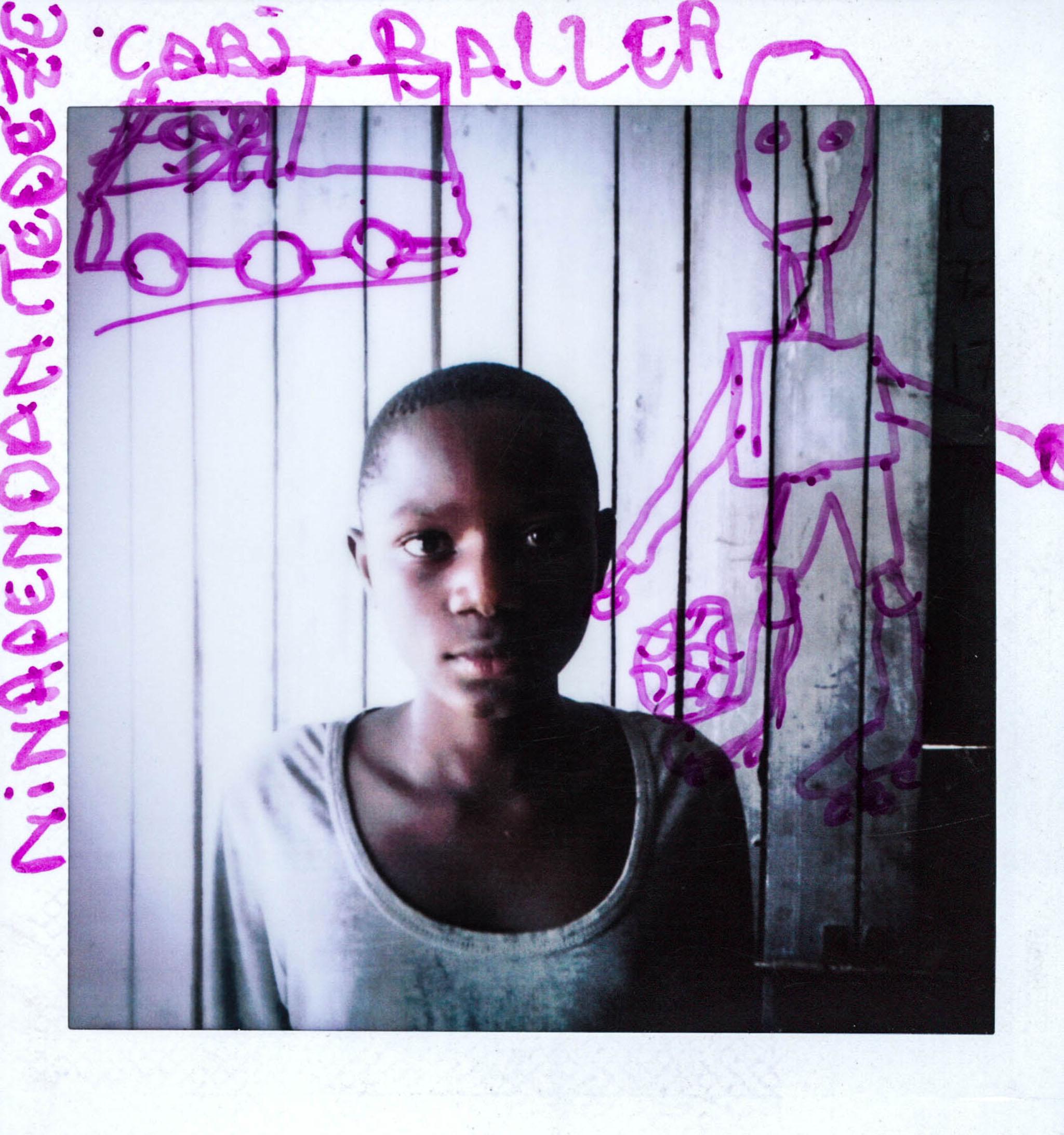 On his second picture, Prisca has drawn of his dream to be a good driver and his love of football, he says: "The picture of the car is about my dream that I will be a good driver. The picture of a standing child with the ball is me."