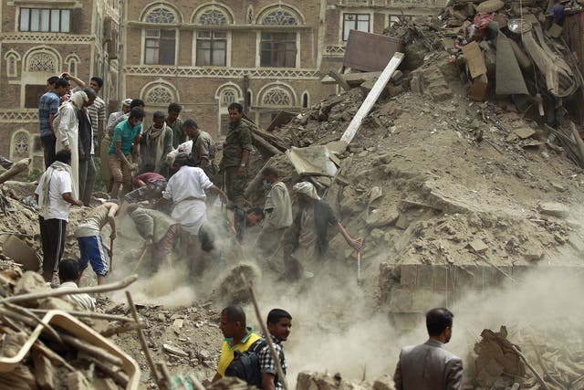 Yemenis search for survivors under the rubble of houses in the UNESCO-listed heritage site in the old city of Yemeni capital Sanaa, on June 12, 2015 following an overnight Saudi-led air strike
