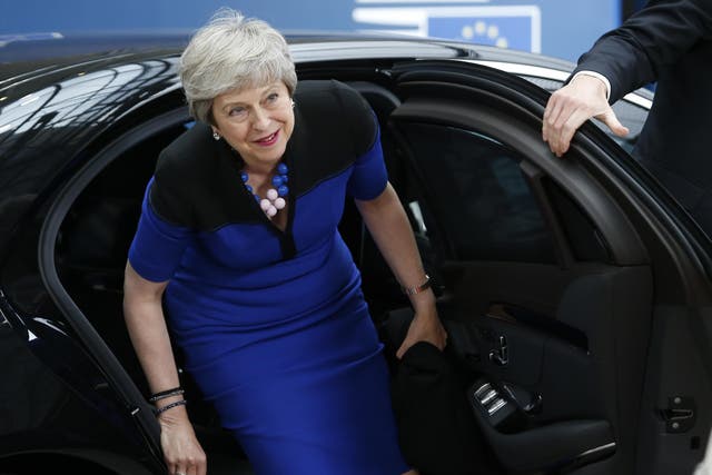 Theresa May arrives at the summit