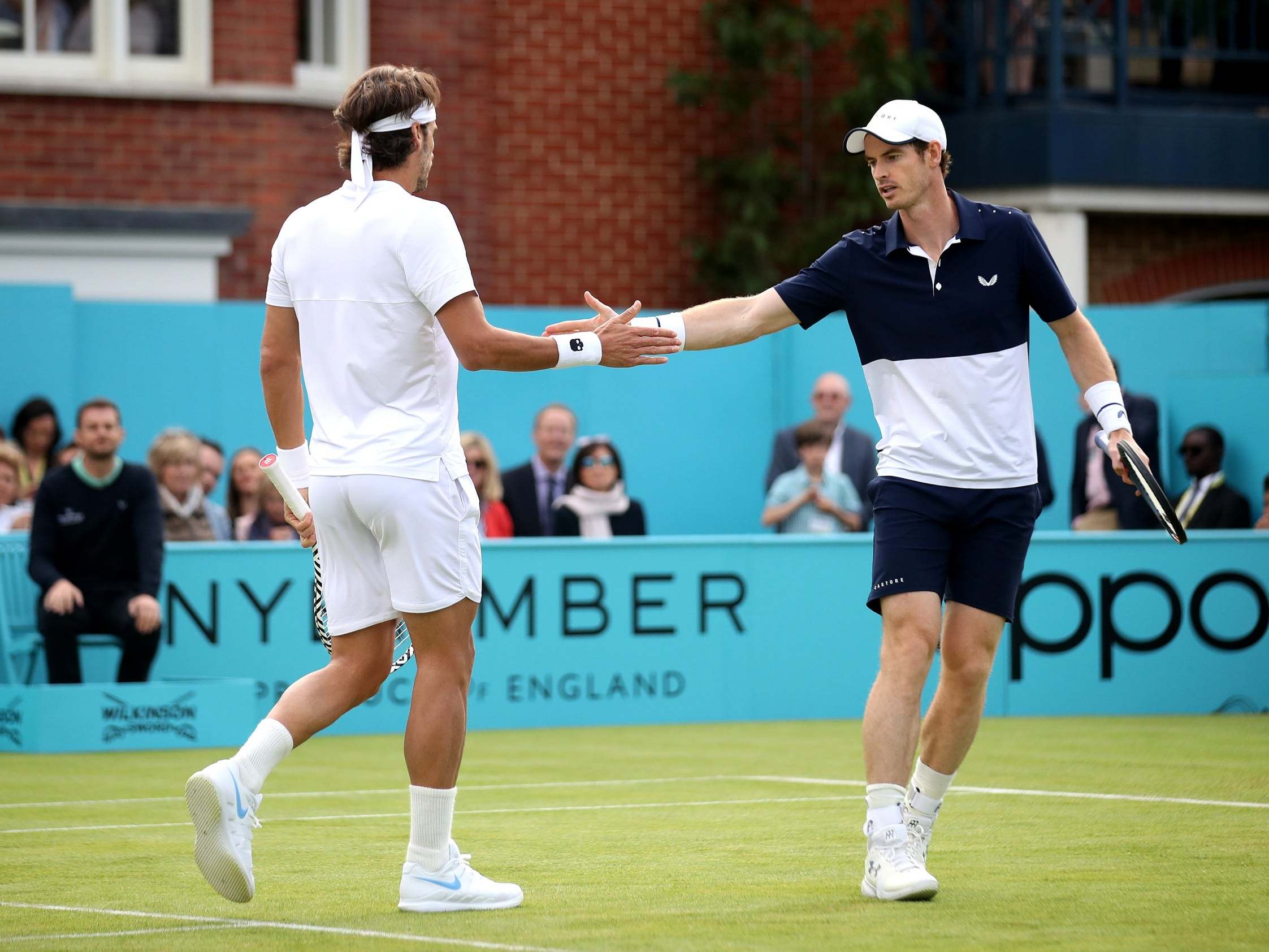 Andy Murray returns to the court with Feliciano Lopez at Queens (Getty)