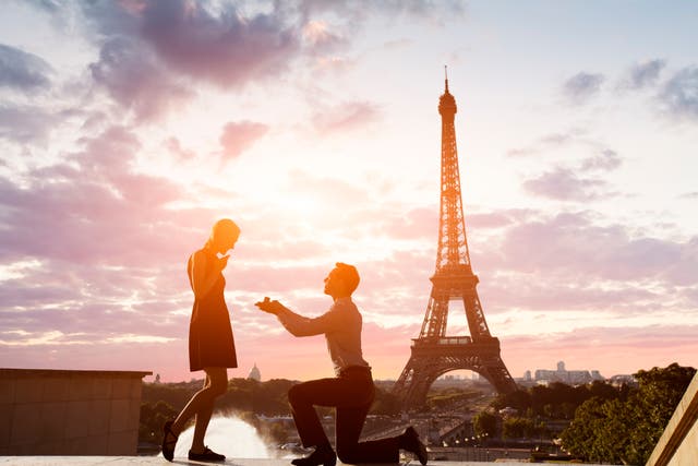 Romantic marriage proposal at Eiffel Tower, Paris, France