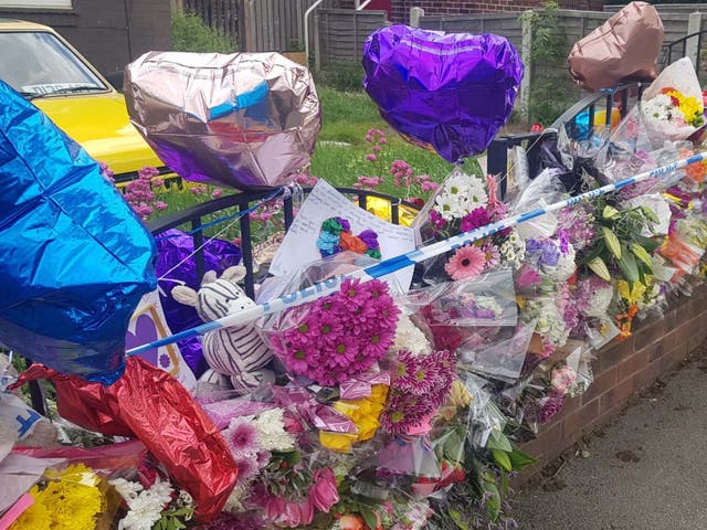 Floral tributes left outside a property in Sheffield after Blake Barrass, 14, and Tristan Barrass, 13, died following an incident on 24 May 2019.