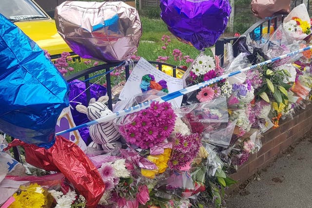 Floral tributes left outside a property in Sheffield after Blake Barrass, 14, and Tristan Barrass, 13, died following an incident on 24 May 2019.