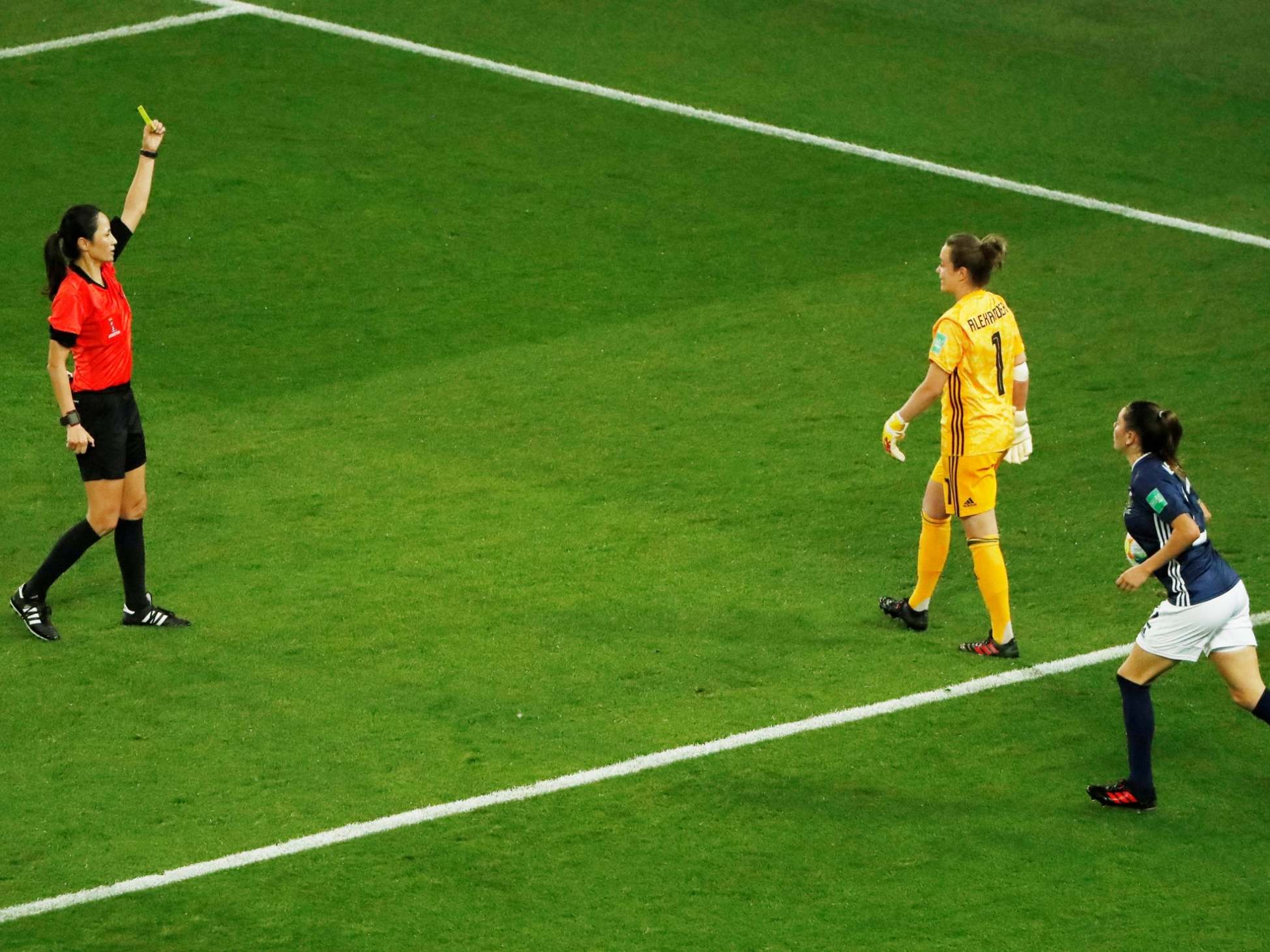 Scotland keeper Lee Alexander was booked for coming off her line during the penalty (Reuters)