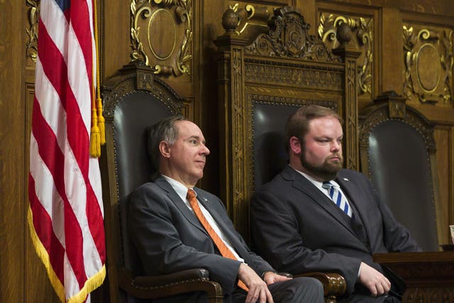 Wisconsin Assembly Speaker Robin Vos (R-Burlington) (L) and Speaker Pro Tempore Tyler August (R-Lake Geneva) listen as Democrats address the Assembly during a contentious legislative session