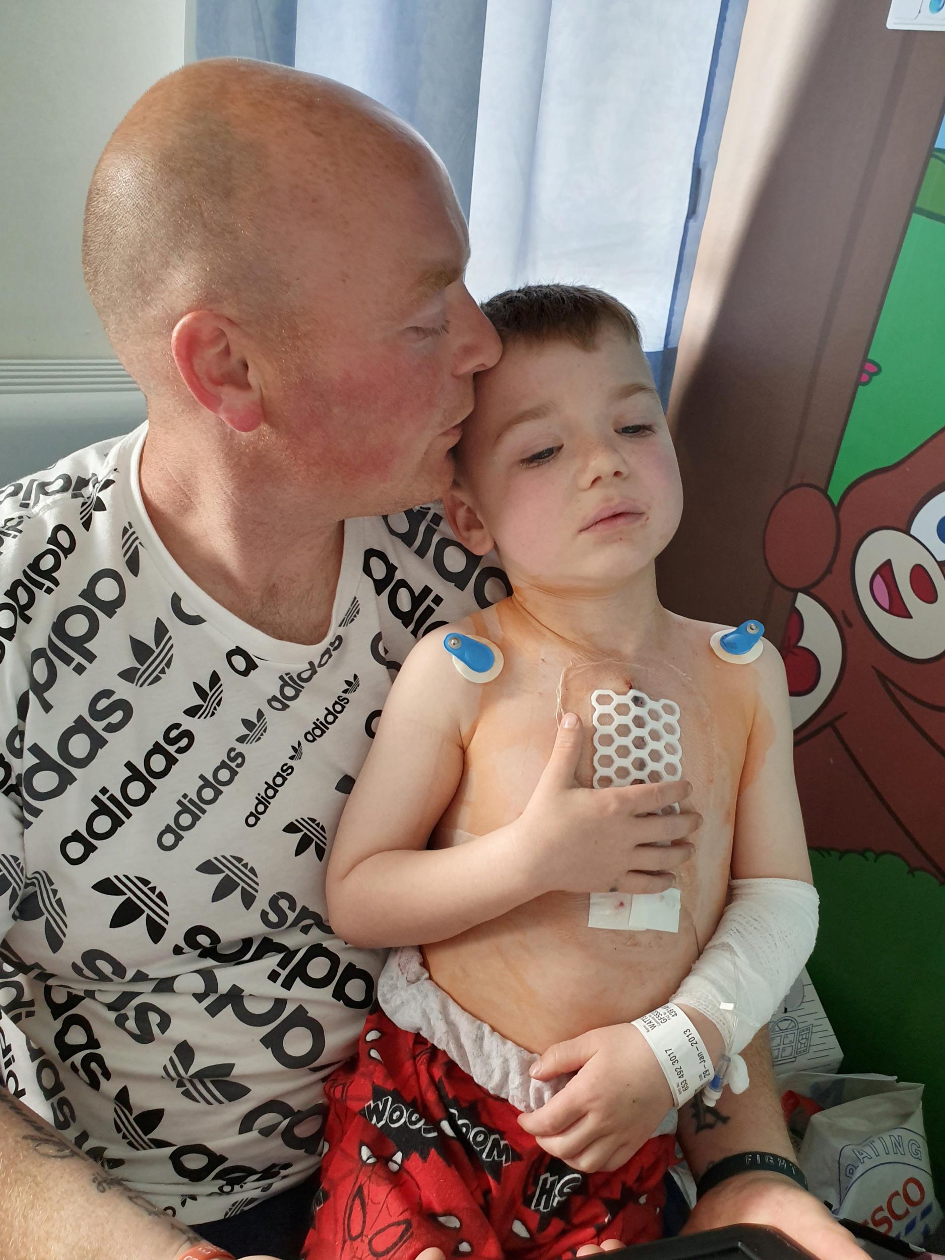 Father gets tattoo on chest to match son's heart surgery scar | The  Independent | The Independent