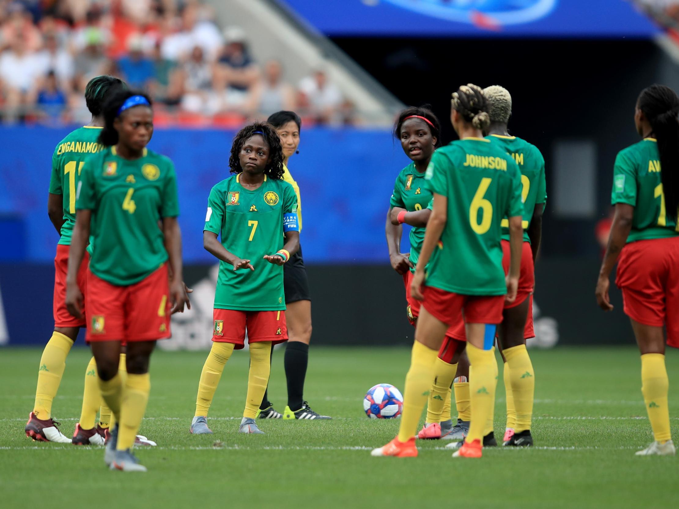 Cameroon's players react after a VAR decision goes against them