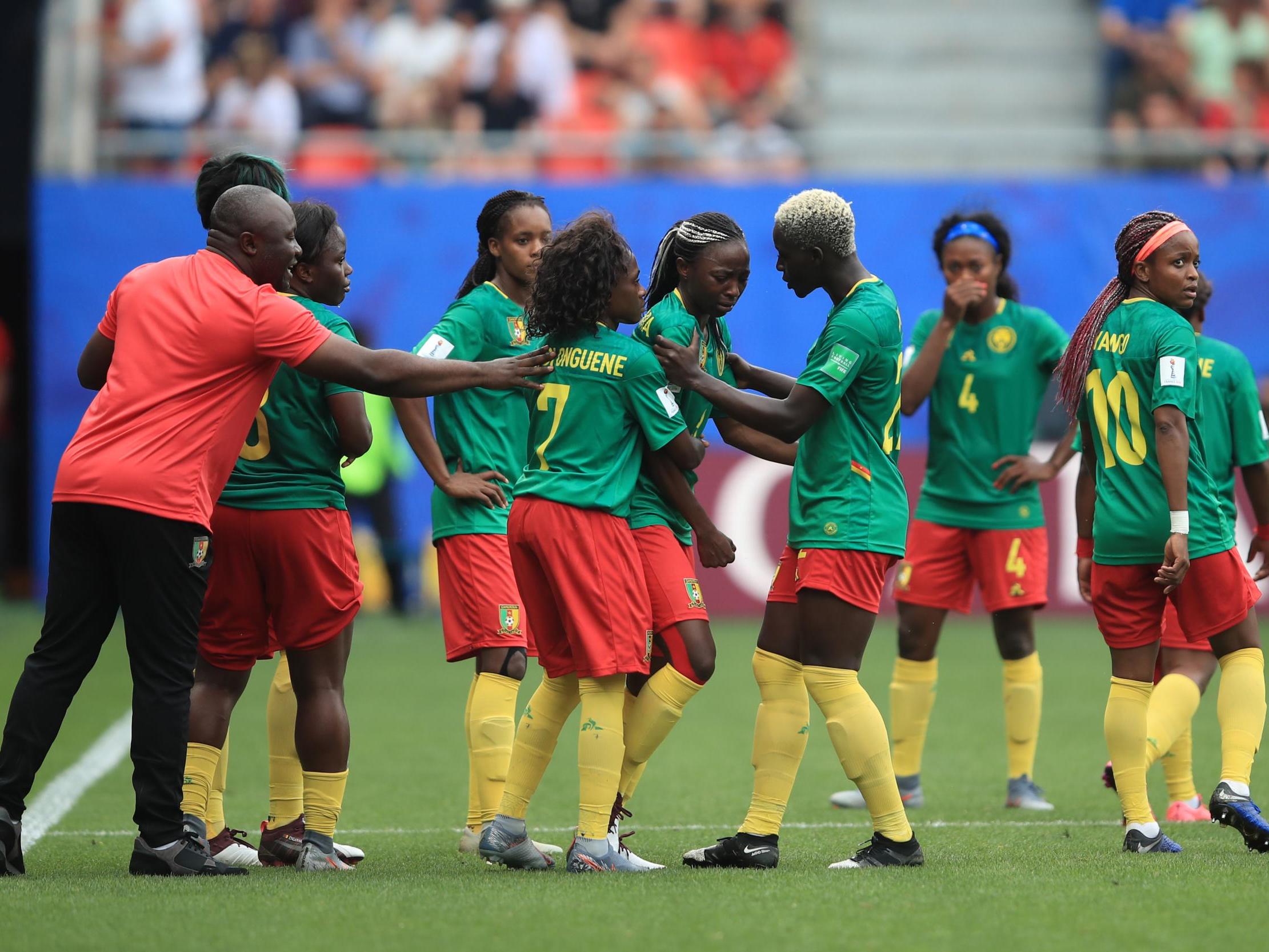 Cameroon's players react after seeing their goal ruled out by VAR