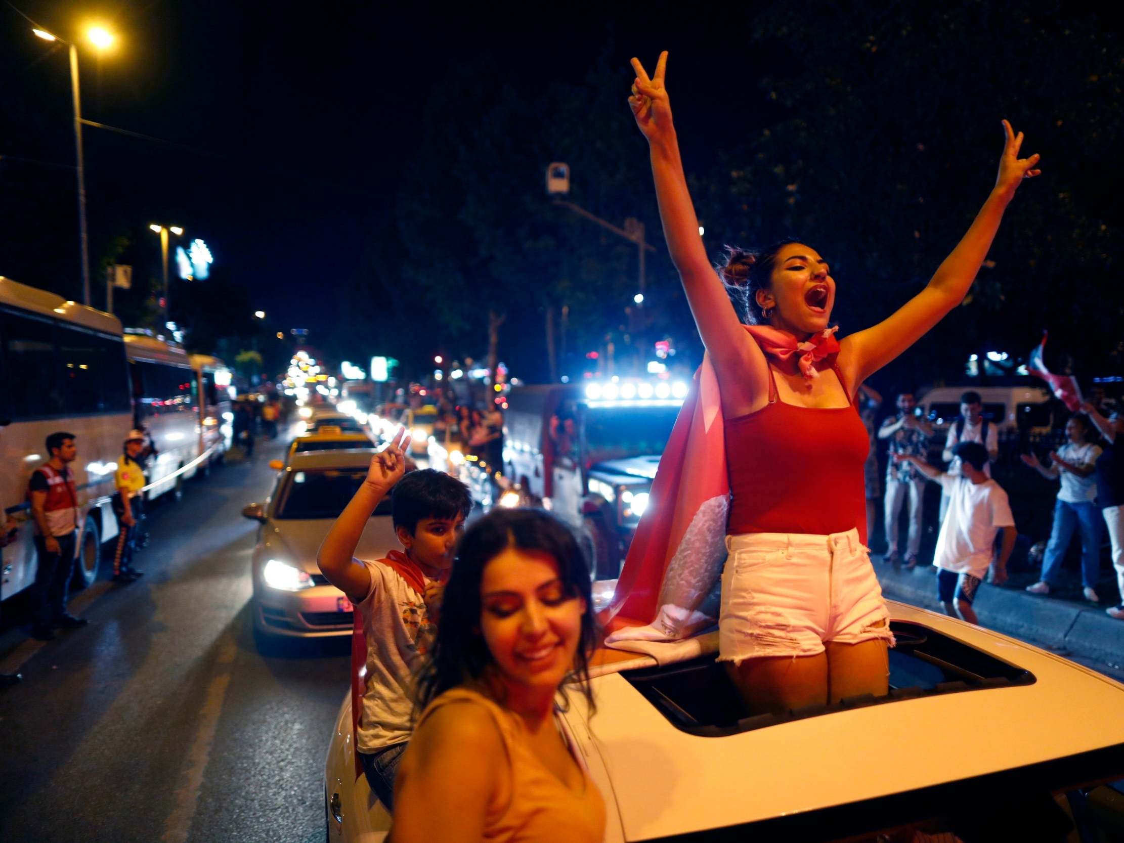 Supporters of Ekrem Imamoglu celebrate in central Istanbul, on Sunday evening
