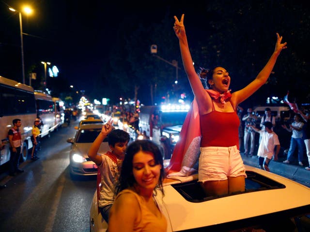 Supporters of Ekrem Imamoglu celebrate in central Istanbul, on Sunday evening