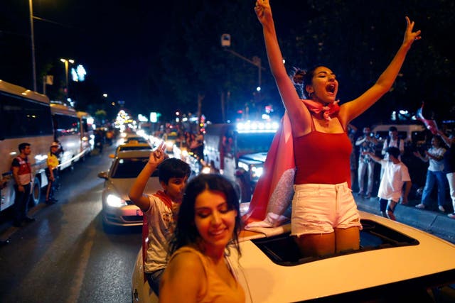 Supporters of Ekrem Imamoglu celebrate in central Istanbul, on Sunday evening