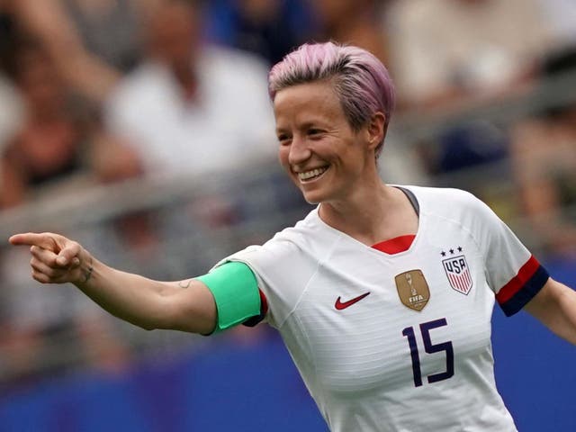 Megan Rapinoe celebrates after scoring