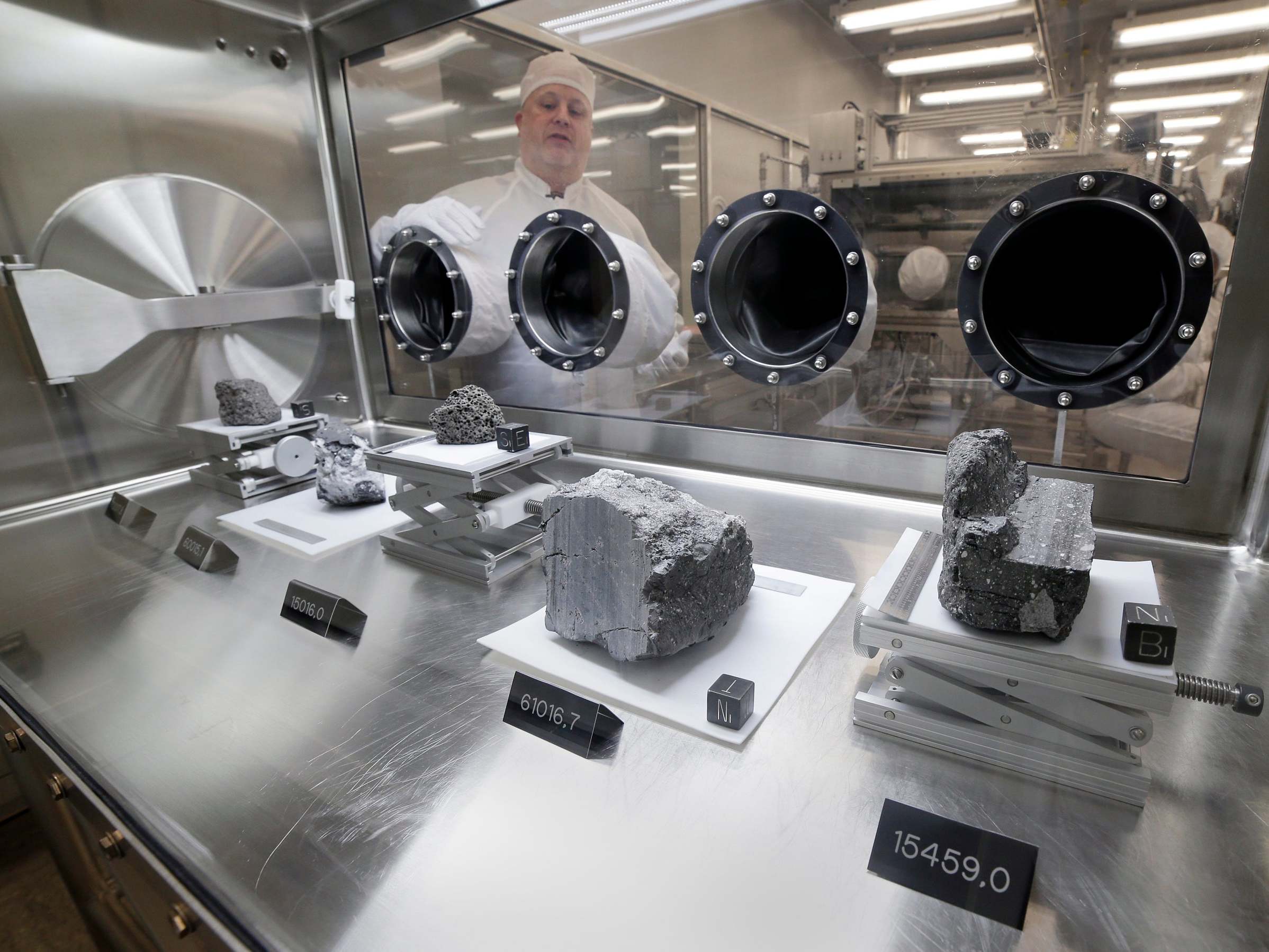 Ryan Zeigler, Apollo sample curator, with a selection of lunar samples