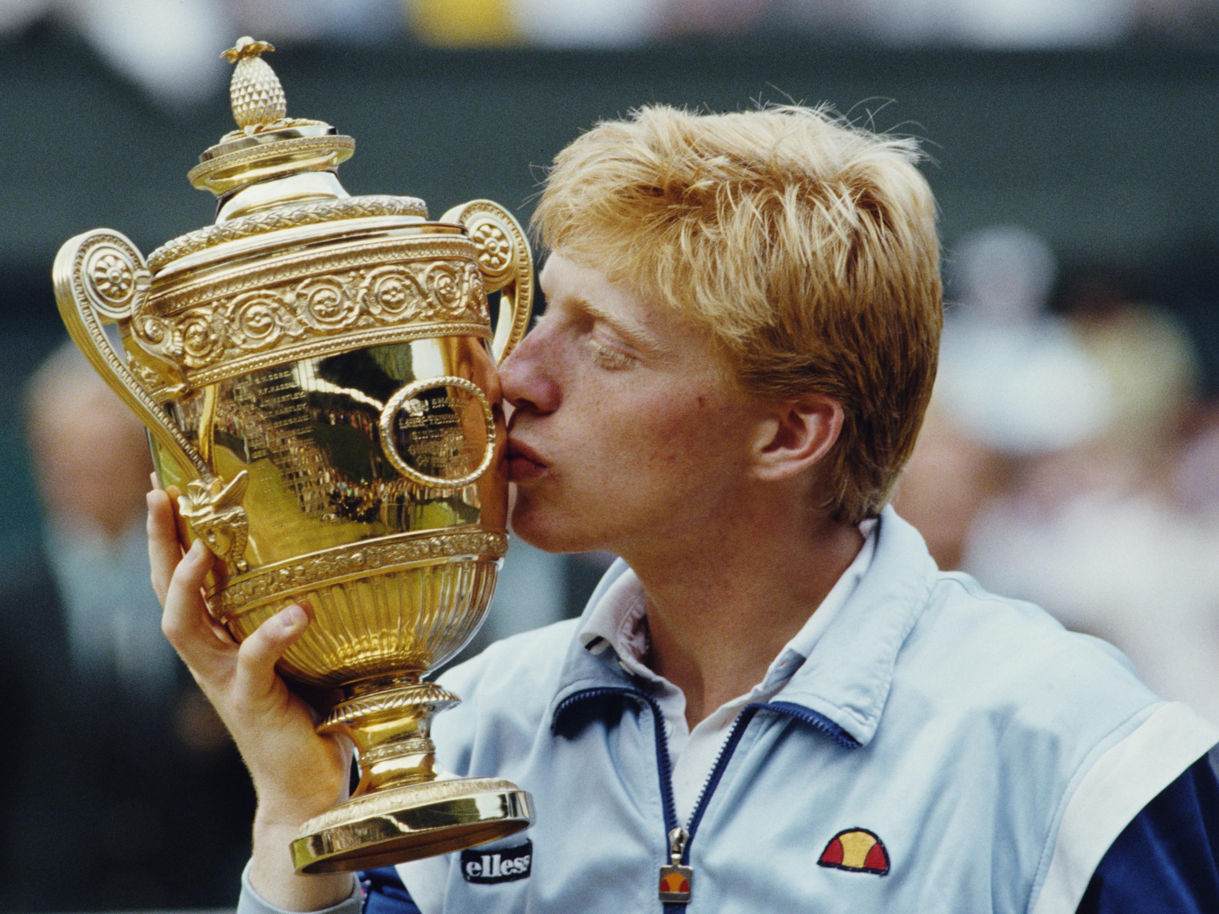 Boris Becker kisses the Gentleman’s trophy to celebrate his momentous victory over Kevin Curren