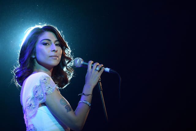 Actress/singer Meesha Shafi performs at the opening night ceremony and gala screening of "The Reluctant Fundamentalist" during the 2012 Doha Tribeca Film Festival at Al Mirqab Hotel on November 17, 2012 in Doha, Qatar.
