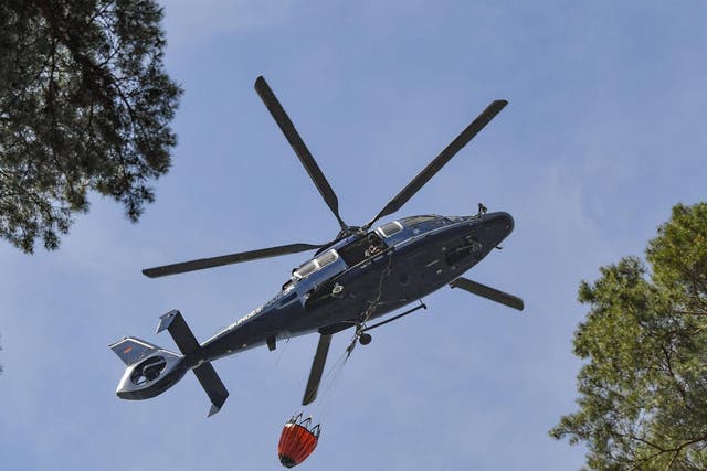 Helicopter collects water in eastern Germany