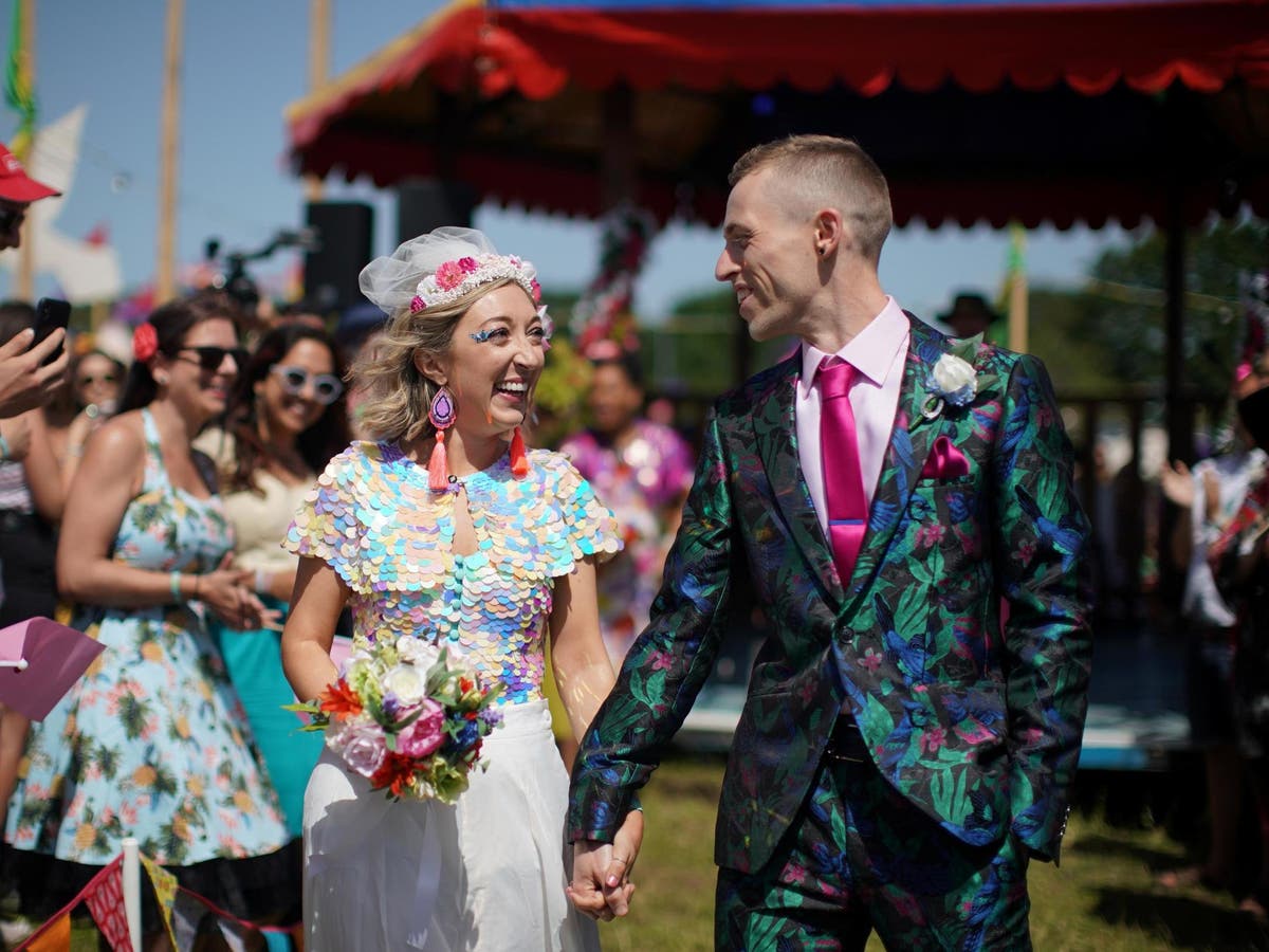 Couple marries at Glastonbury two years after becoming engaged at festival