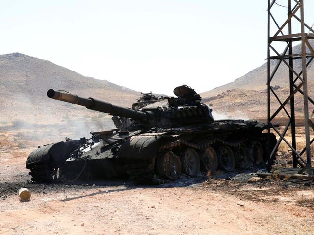 A destroyed tank hat belonged to forces led by Khalifa Haftar.