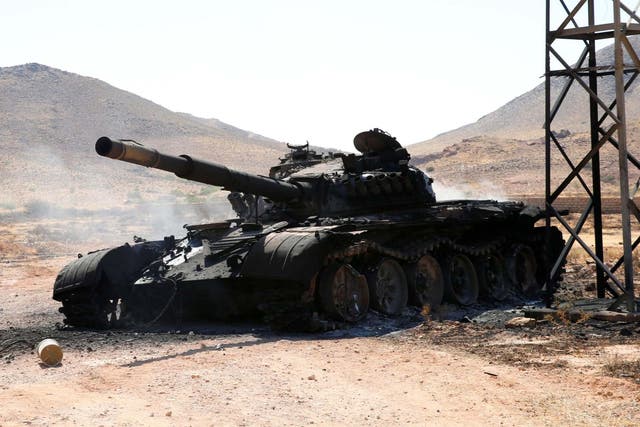A destroyed tank hat belonged to forces led by Khalifa Haftar.