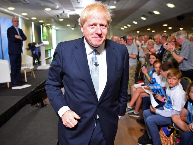 Boris Johnson leaves the Conservative Party leadership hustings event in Exeter