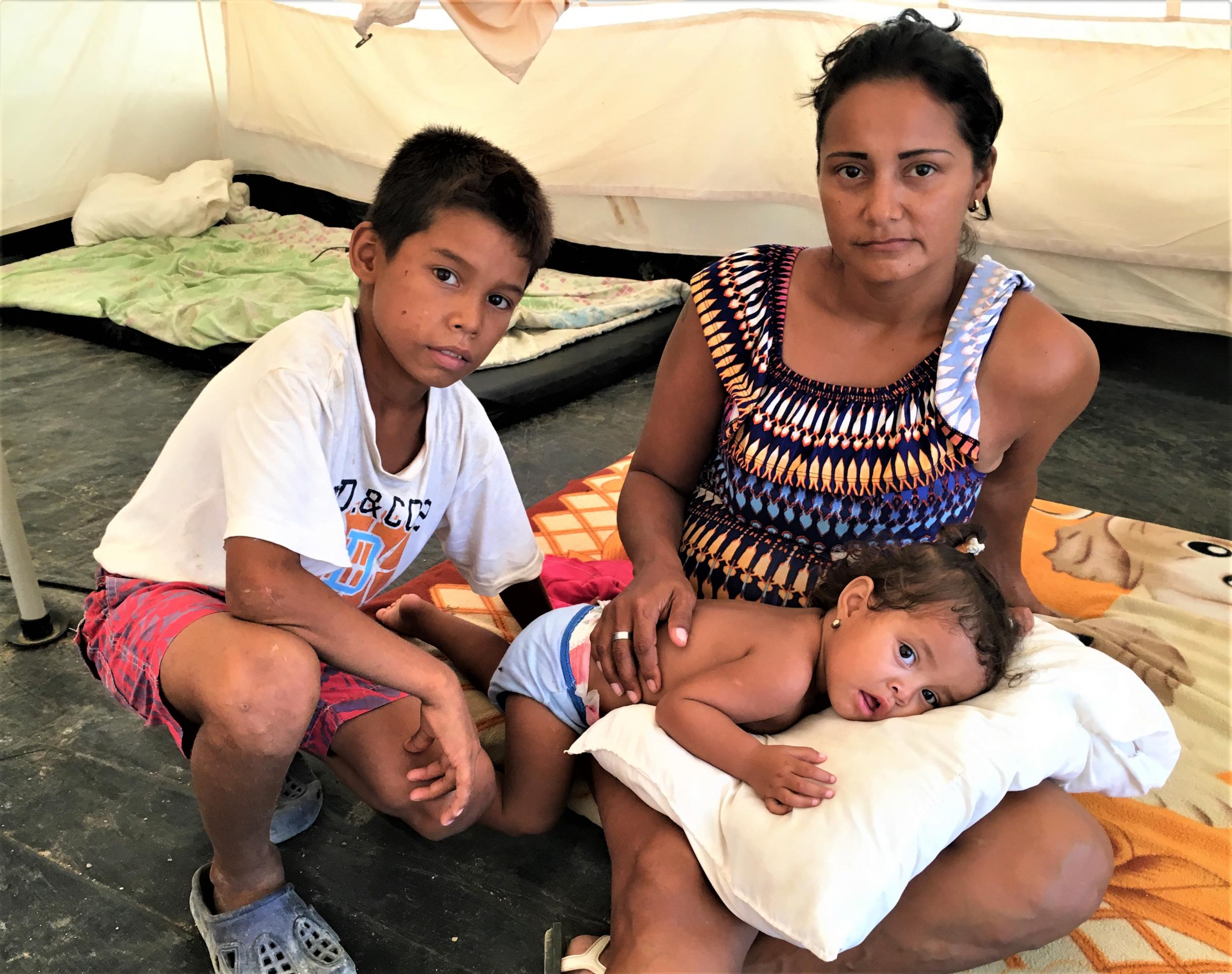 Ruely Adriana Gonzalez and her children in a UN camp in Colombia. The family have no possessions, no money, no contacts