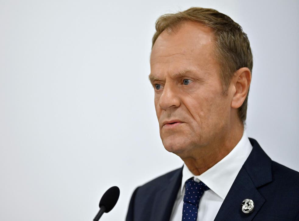 Donald Tusk attends a press conference during the G20 Osaka Summit