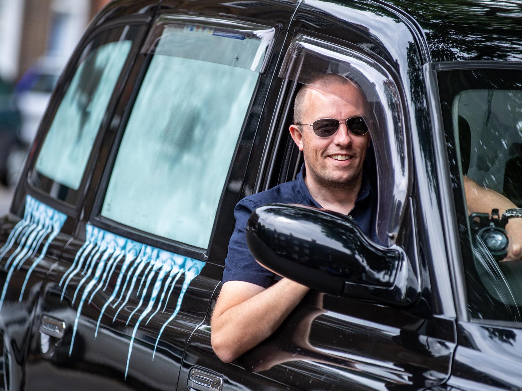 The "coolest ride" in town, London Black cab is decked out to be the ultimate summer ice-box taxi for over-heated commuters ( SWNS)