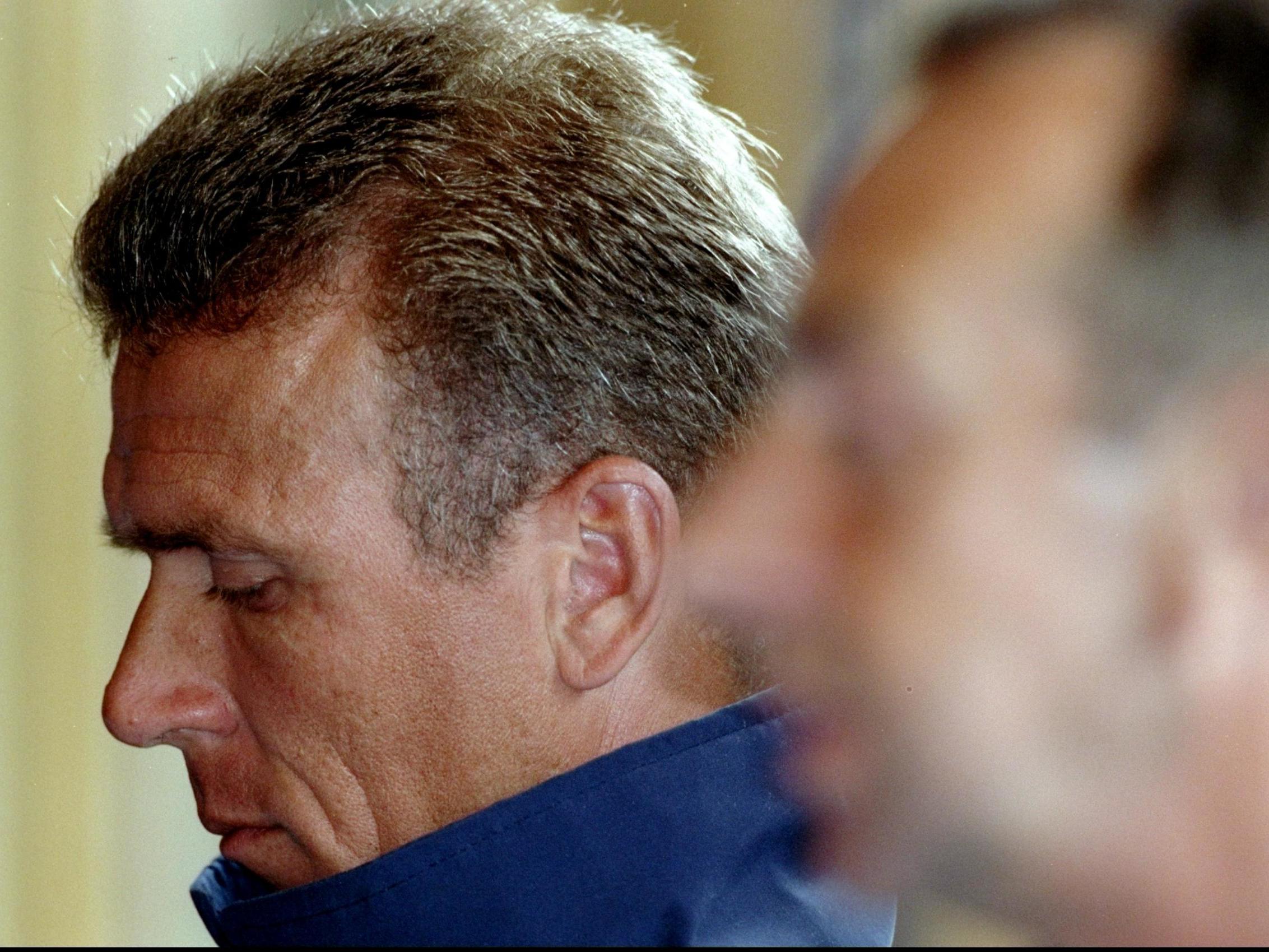 Alec Stewart looks on during a press conference after England's World Cup exit