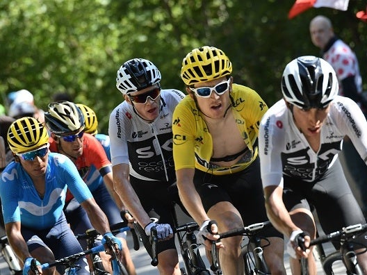 Yellow jersey holder Geraint Thomas follows Egan Bernal during the twelfth stage of last year’s Tour de France