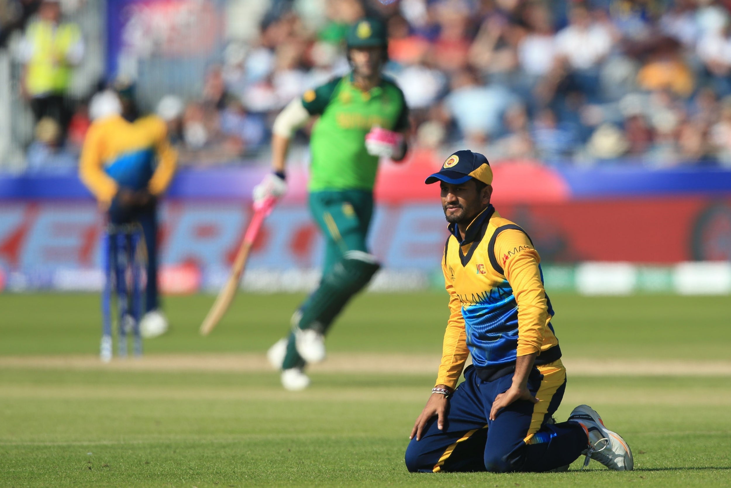 Dimuth Karunaratne reacts to a misfielding