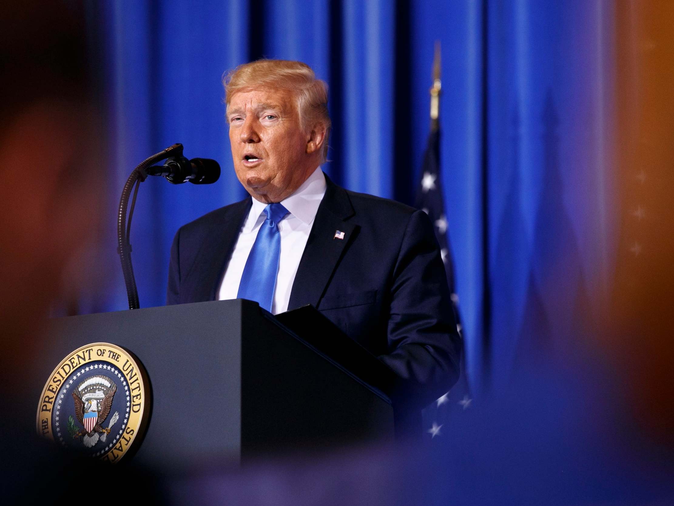 Donald Trump speaks during a news conference in Osaka