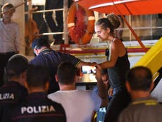 Rescue ship captain arrested after taking migrants to Italian port