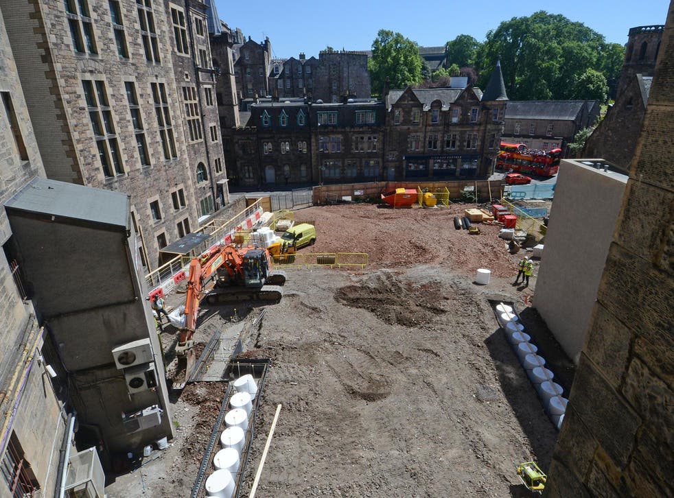 Building of first Virgin Hotel in Britain has been delayed for a year after archaeologists at the Edinburgh site unearthed artefacts dating back 1,000 years