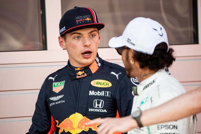 Max Verstappen speaks with Lewis Hamilton after qualifying for the Austrian Grand Prix